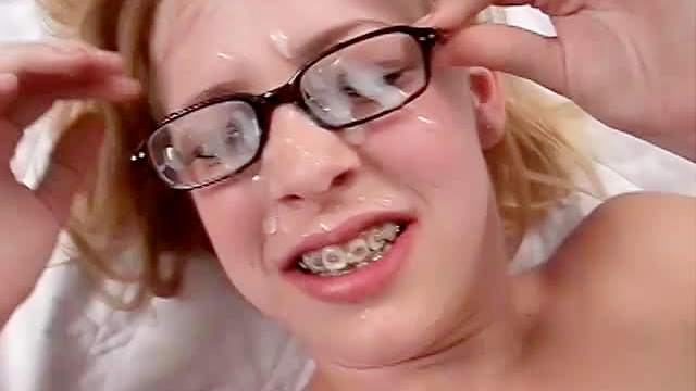 Braces and glasses on teen nerd slut