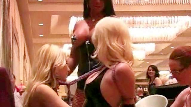 Kinky lesbian sex at porn convention