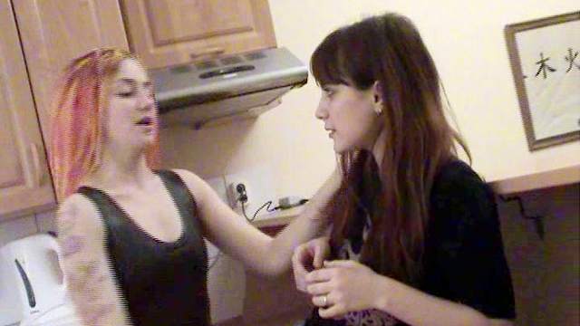 Leather dress mistress dominates lesbian