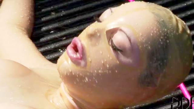 Rubber girl water play in the truck bed