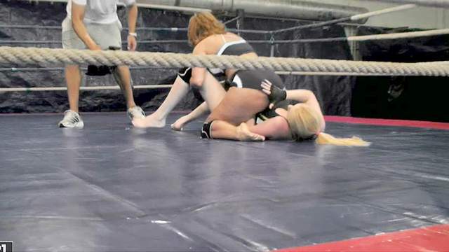 Hot women wrestle in the ring