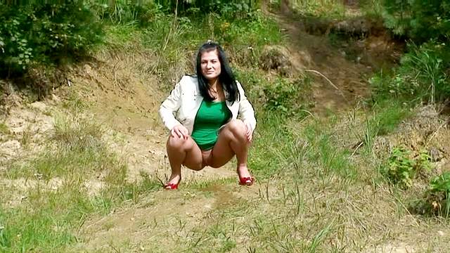 Short dress on chick pissing outdoors