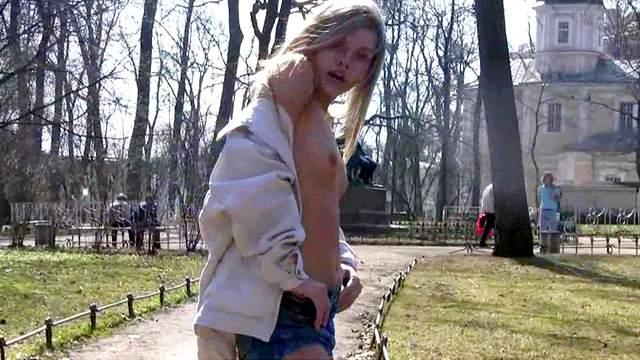 Pretty girl models tits in public