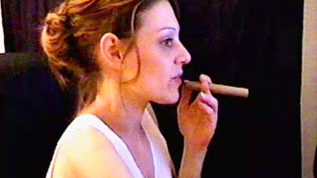 Cute babes smokes a cigar and poses on camera