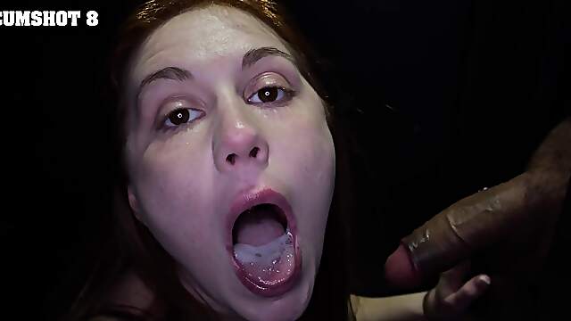 Two redheads, Ellie Murphy and Eve Bardot, in a gloryhole scene