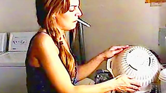 Sexy smoker loves to puff away