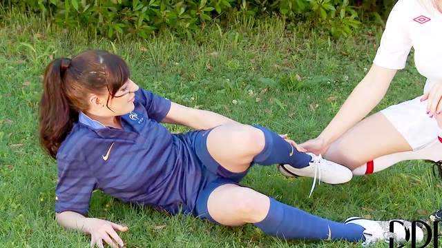 Soccer girls suck dirty feet outdoors