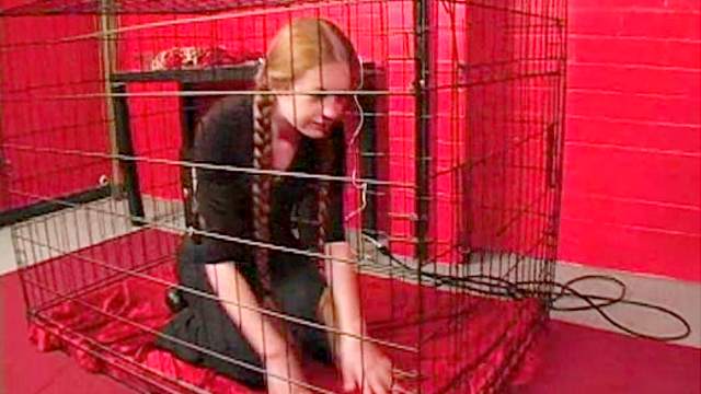 Teen redhead in pigtails caged by mistress