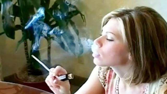 Smoking and modeling pierced pussy