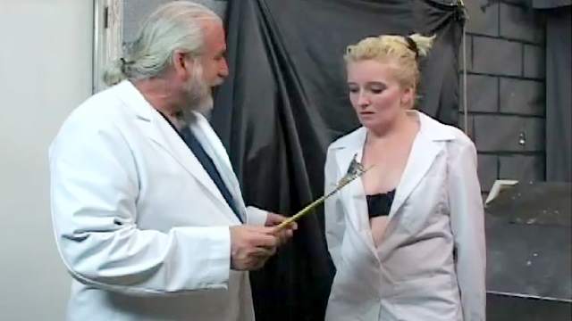 Doctor experiments on BDSM girl in dungeon