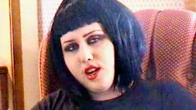 Goth girls smoke and talk at home