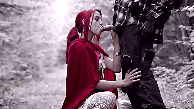 Redheaded babe takes a pick-pick axe in the woods