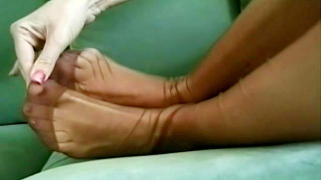 Blonde makes nylon foot tease porn