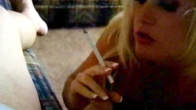 She smokes her cigarette and gives a BJ