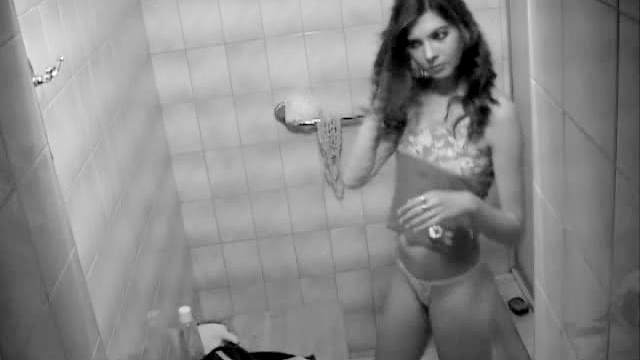 Voyeur teen striptease in bathroom
