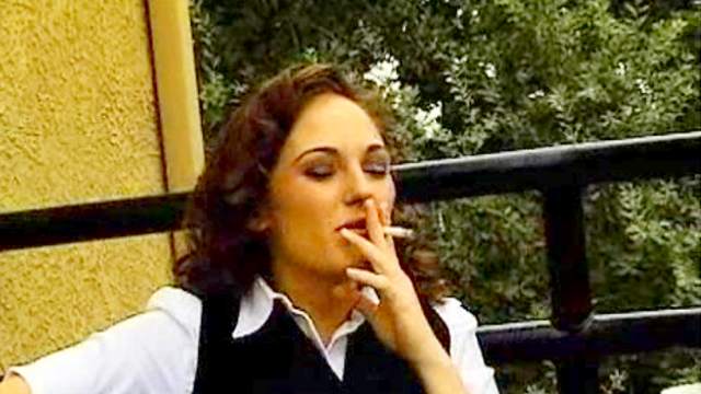 Smoking outdoors in skirt and pantyhose