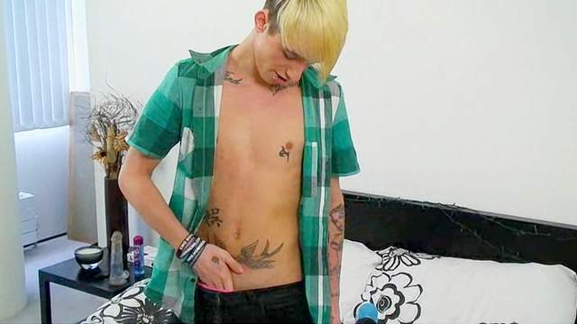 Tattoos on the blonde boy masturbating