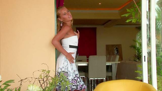 Sexy tanned babe Susane is playing with her body