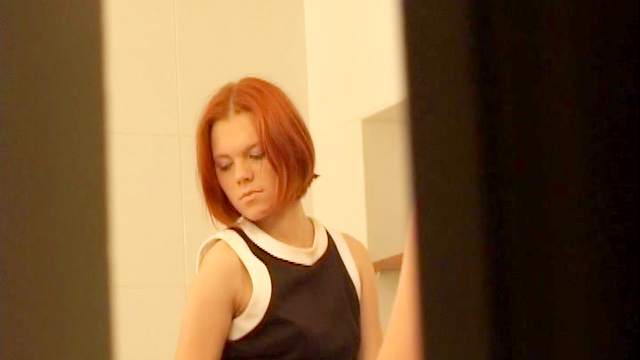 Redhead Emily masturbating in the bathroom