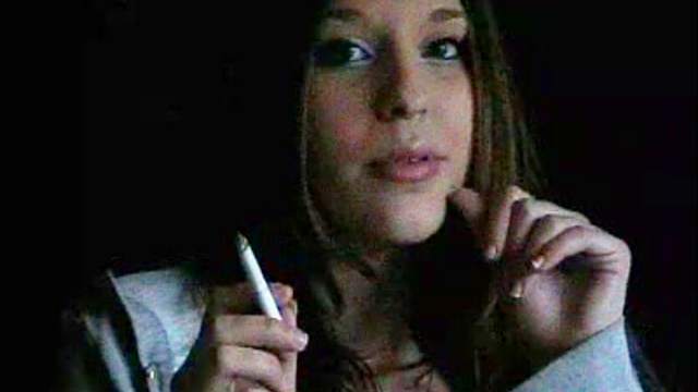 Stunning beauty smoking cigarette