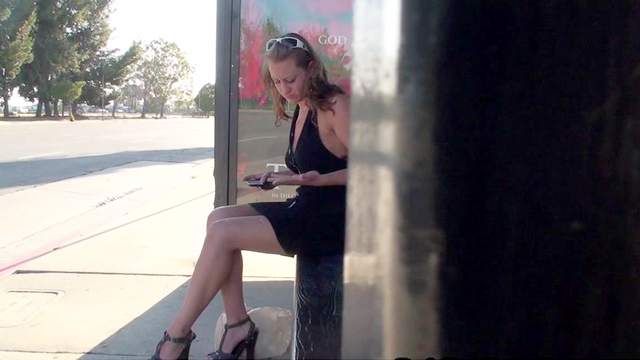 Lizzy London is texting sms on the hidden camera