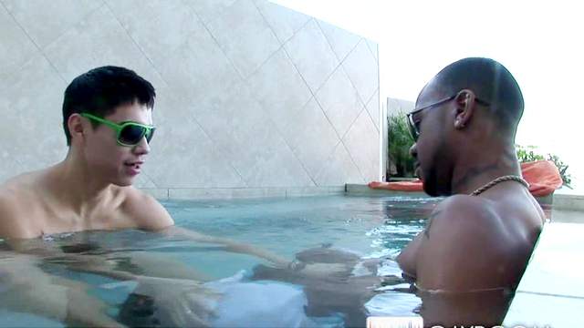 Alec Grey is making a blowjob to that black guy