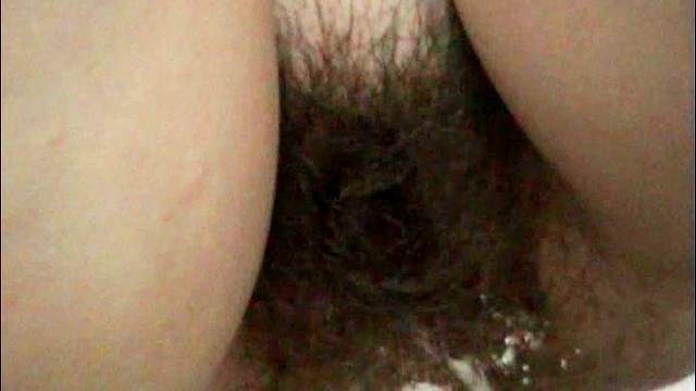 Unshaved pussy is pissing very well