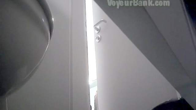 Sexy babe is pissing on the spy camera