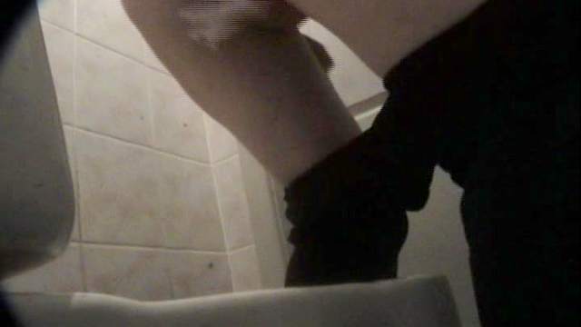 Sexy unknown babe is pissing in the toilet