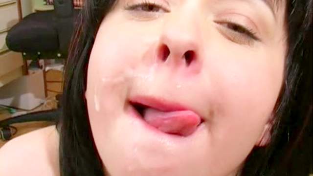 Sensual brunette is getting load of cum over her lips