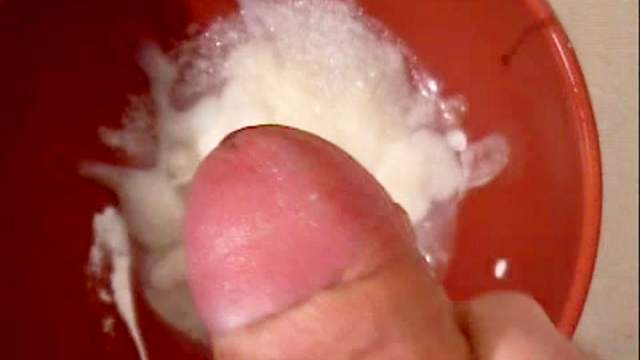 Slutty redhead babe is eating cum for a deep plate