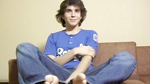 Curly gay Logan Miles masturbates his dick