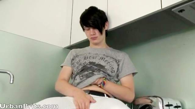 Slender gay with dark hairs is masturbating