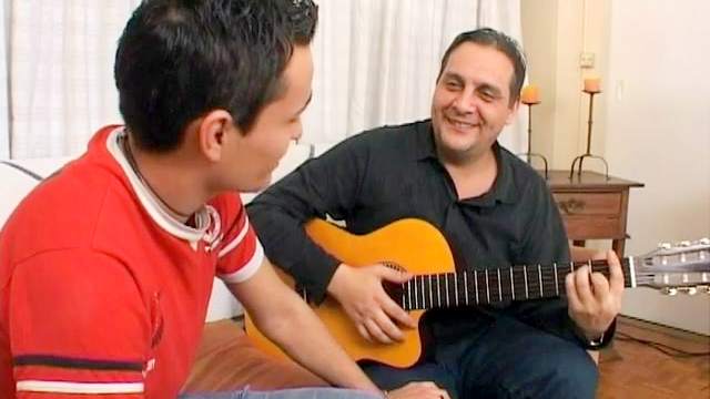 Slender dude fucks in his mouth after playing on guitar