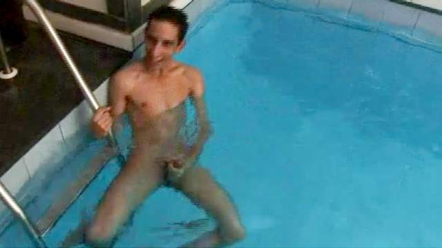 Skinny dude is lying and sucking his dildo